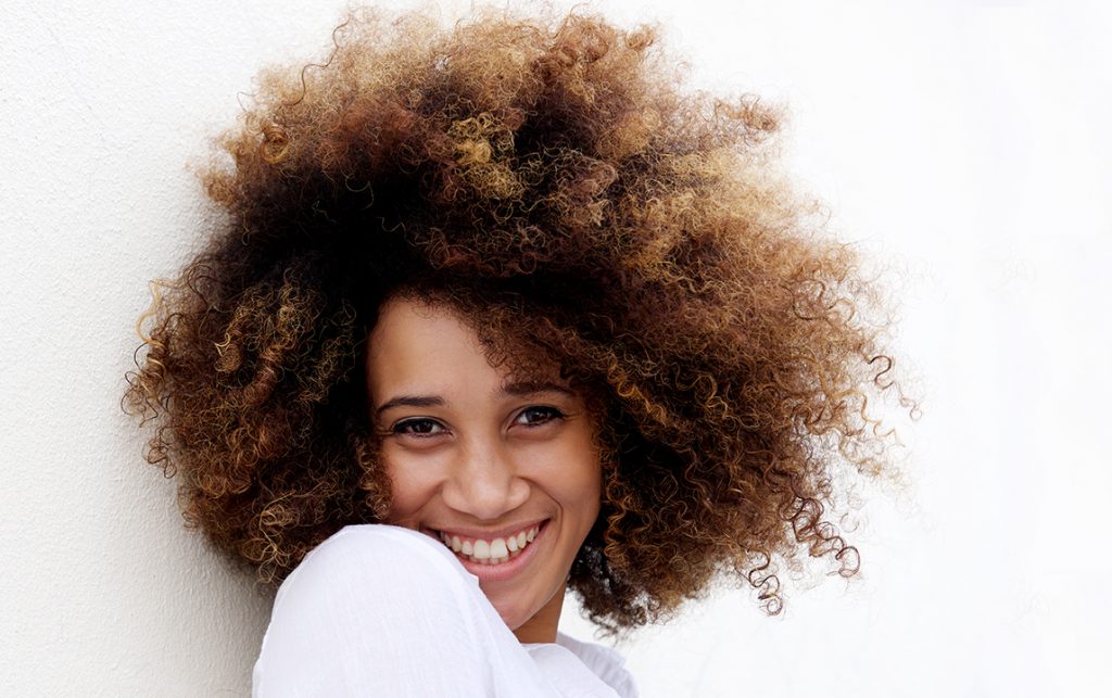 Woman posing with beautiful straight teeth