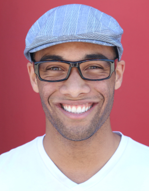 Smiling patient shows off his teeth that were straightened by Millbrae orthodontist Dr. April Lee.