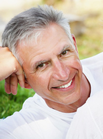 Smiling patient shows off his teeth that were straightened by Hillsborough orthodontist Dr. April Lee.