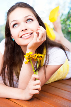 Smiling girl got braces from a Hillsborough orthodontist to straighten her teeth.